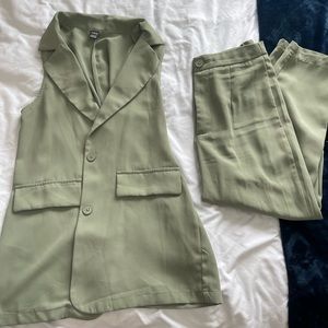 Matching 2 piece blazer and dress pants. Petite XS. Like new.